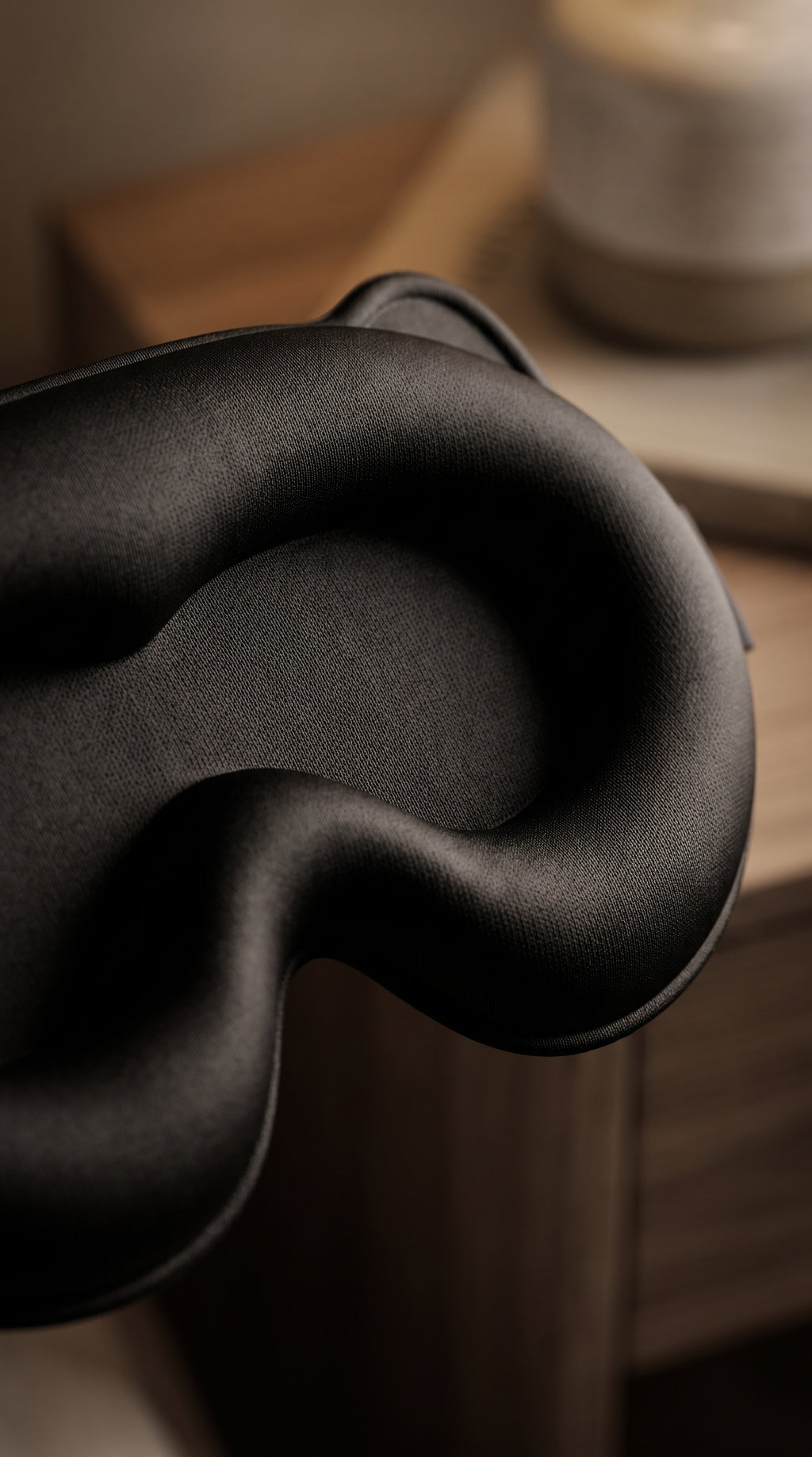 Detail of the Lullia contoured blackout sleep mask's 3D molded cups